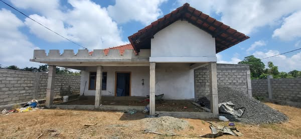 New Unfinished House with Boundary Walls on  Land for Sale in Uduvil